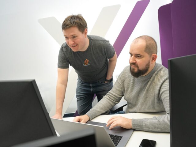 youniqx team members working together