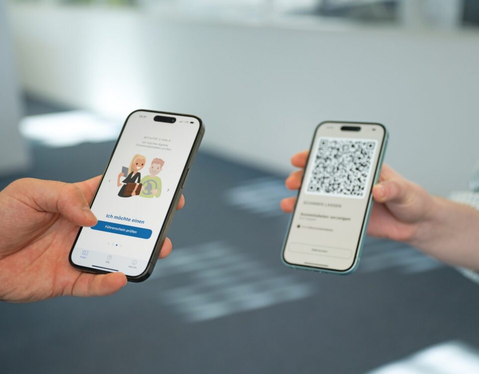 Picture of two smartphones with Austrian digital document App eAusweise on screen